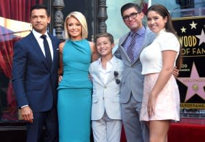 Mark Consuelos (left), Kelly Ripa, Joaquin, Lola and Michael Consuelos.