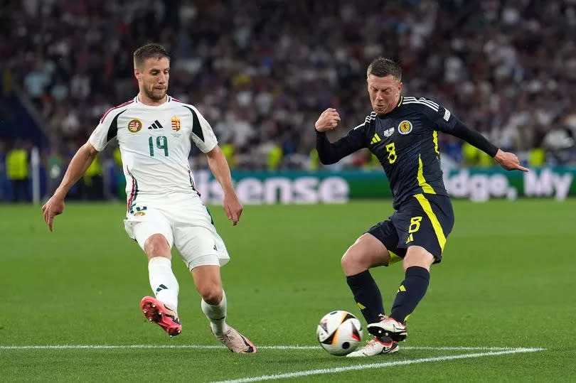 Hungary's Barnabas Varga (left) and Scotland's Callum McGregor battle for the ball during the UEFA Euro 2024 Group A match at the Stuttgart Arena in Stuttgart