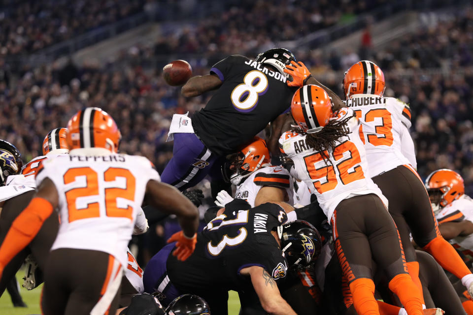 Lamar Jackson came up just short of the goal line before fumbling. (Getty)