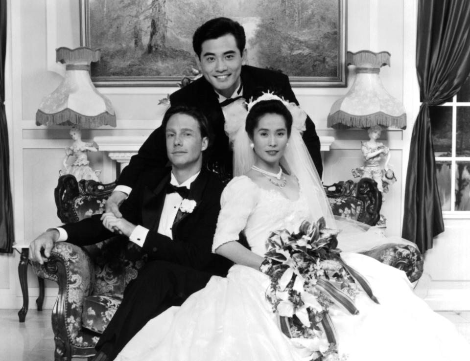Actors Mitchell Lichtenstein, Winston Chao and May Chin appear in wedding attire for the poster for "The Wedding Banquet."