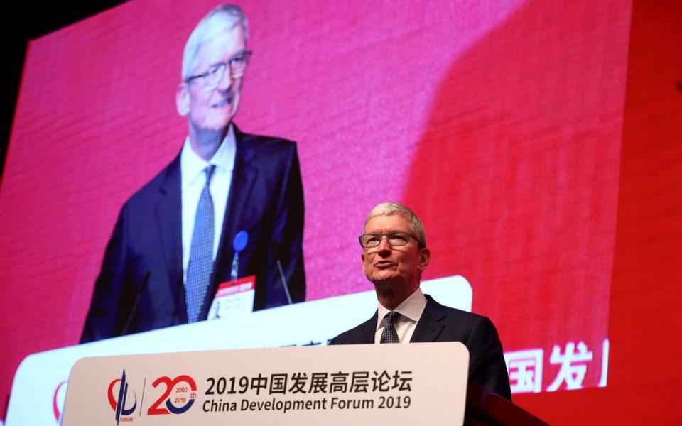 Apple chief executive Tim Cook speaking in China last year - AP