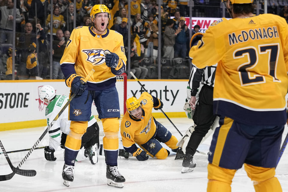Nashville Predators right wing Michael McCarron (47) celebrates a goal against the Dallas Stars during the second period of an NHL hockey game Saturday, Dec. 23, 2023, in Nashville, Tenn. (AP Photo/George Walker IV)