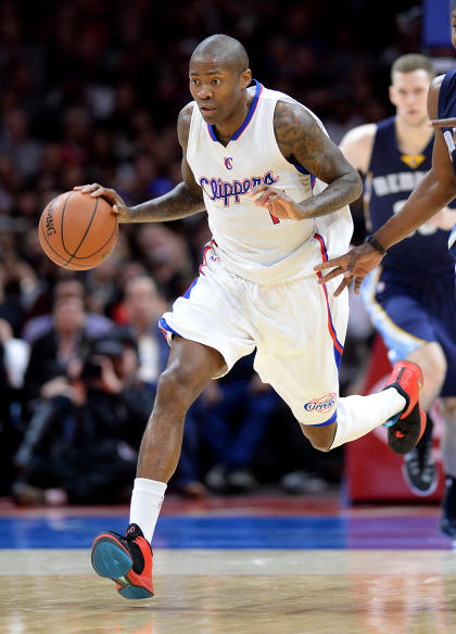 Feb 23, 2015; Los Angeles, CA, USA; Los Angeles Clippers guard Jamal Crawford (11) controls the ball in the first half of the game against the Memphis Grizzlies at Staples Center. (Jayne Kamin-Oncea-USA TODAY Sports)