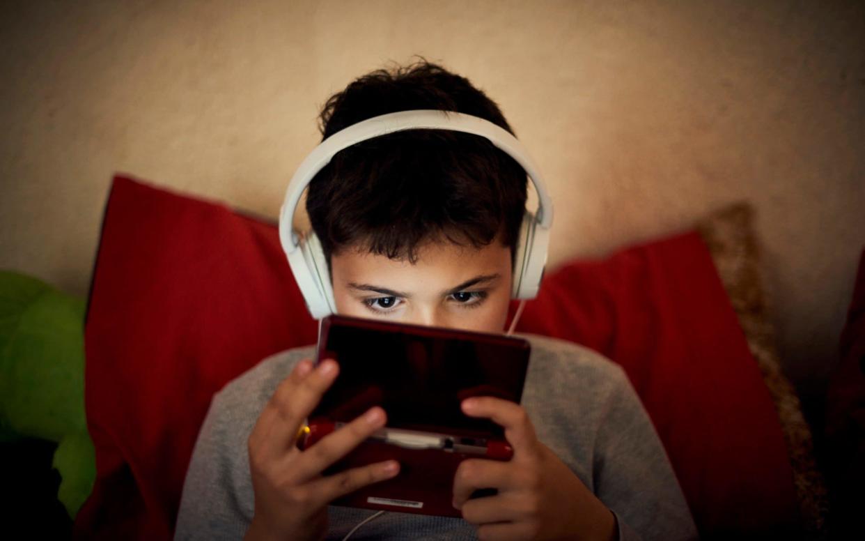 Dr Begent sees children who are suffering from physical symptoms of a gaming addiction - Blend Images