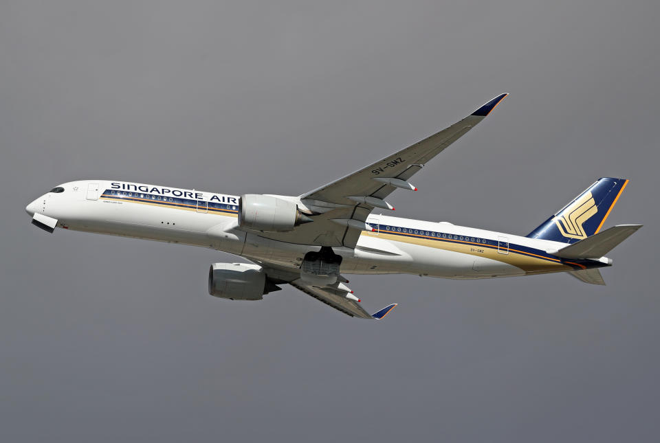 An Airbus A350-941 from Singapore Airlines (SIA) is taking off from Barcelona Airport in Barcelona, Spain.