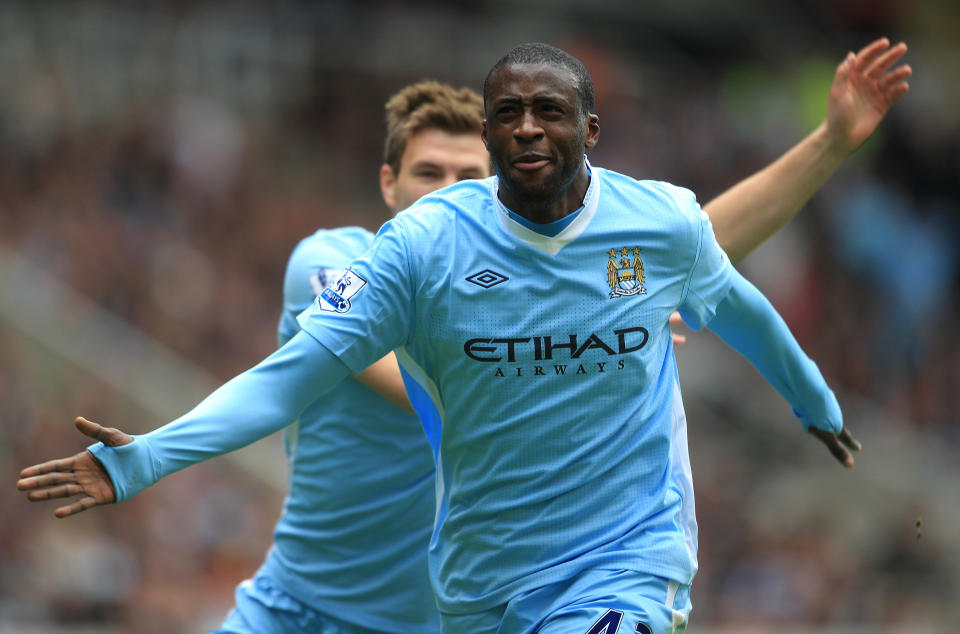  Manchester City's Yaya Toure celebrates scoring the first goal