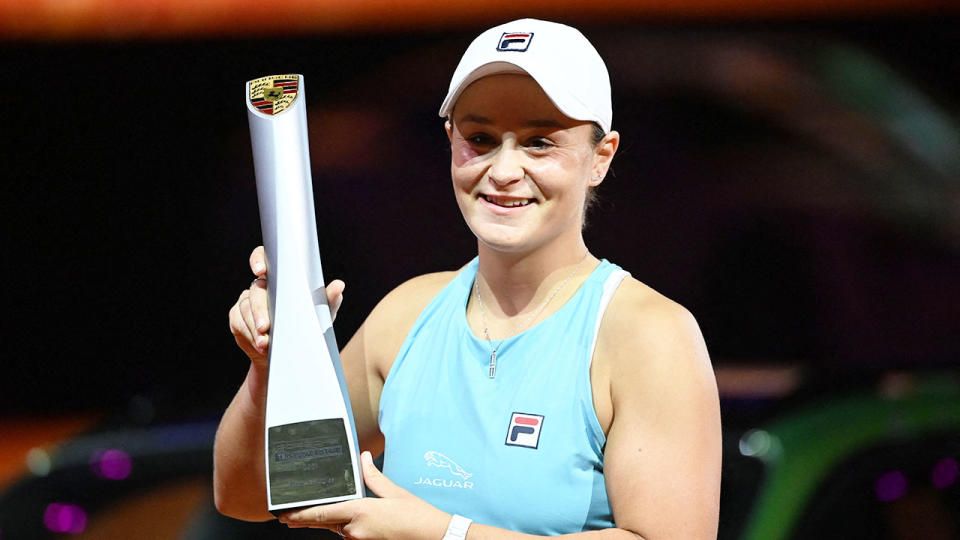 Seen here, Ash Barty poses with the trophy after winning the Stuttgart Open.