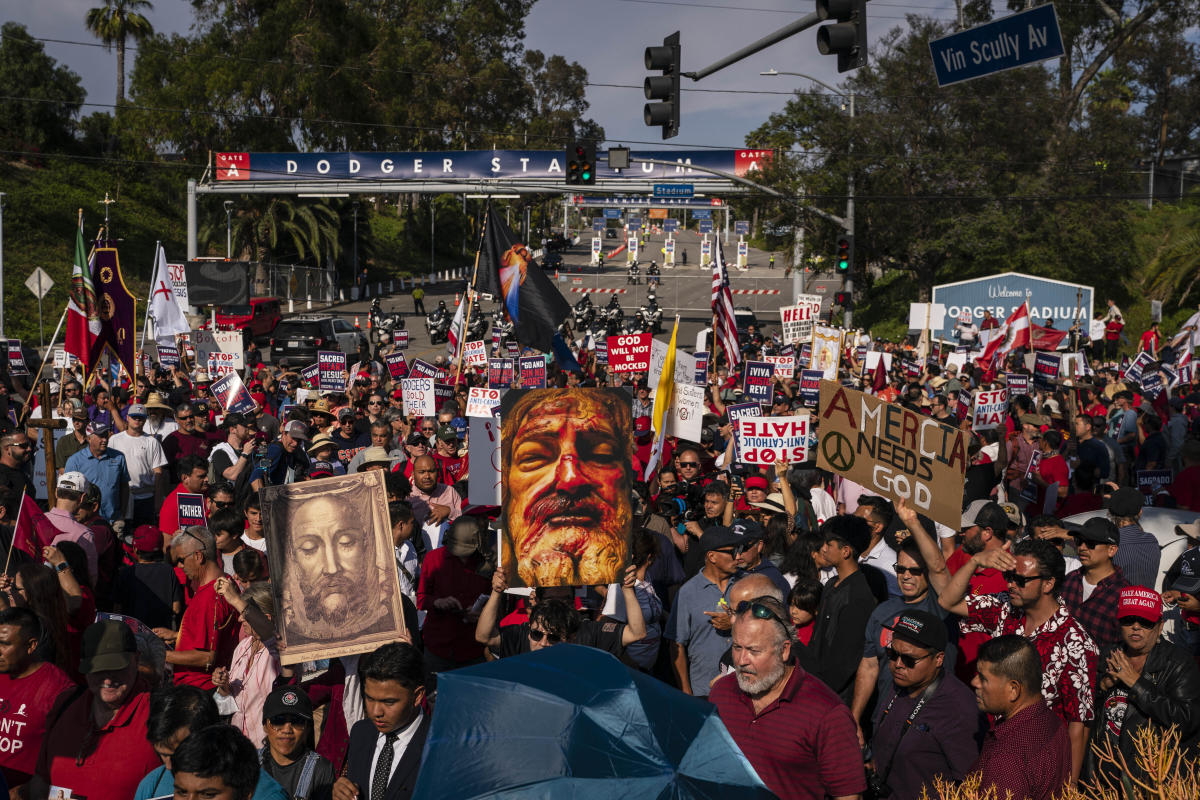 Thousands gather outside Dodger's Stadium to protest team's