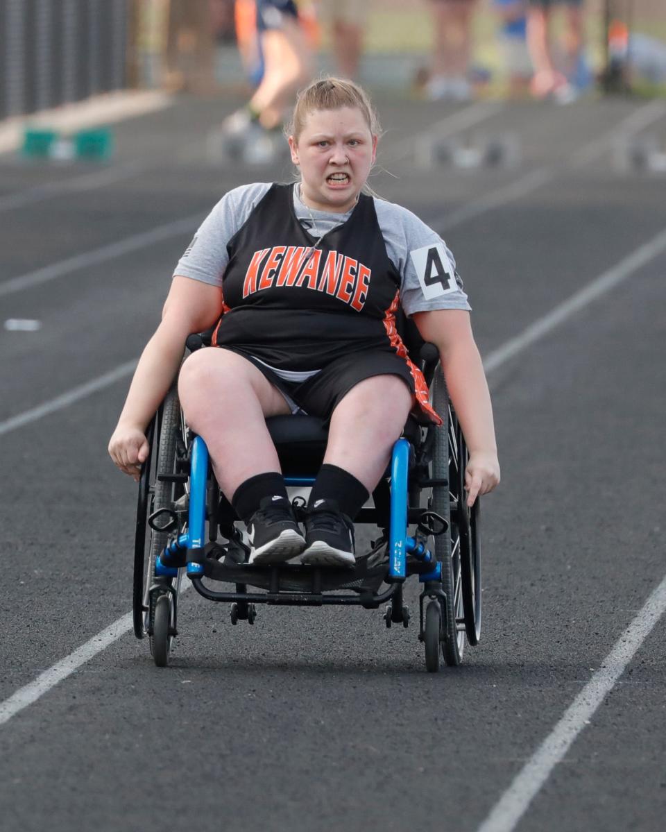 Makenna Peed, competing here at the IHSA sectionals, qualified for state in four Wheelchair Division events.