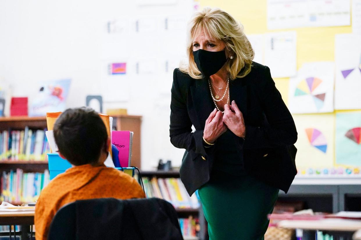 US First Lady Jill Biden speaks with students in Becky Taylors classroom as she visits the Christa McAuliffe School in Concord, New Hampshire, on March 17, 2021