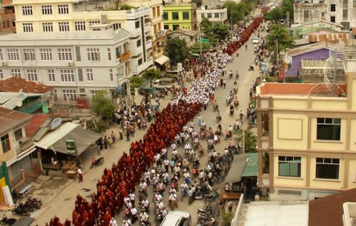 Myanmar Buddhist monks rally on the streets of Mandalay. Hundreds of Buddhist monks marched in Myanmar Sunday to support President Thein Sein's suggestion that Muslim Rohingya be deported or held in camps, in the biggest rally since the end of junta rule