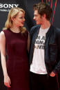 Our hearts are breaking! Emma Stone and Andrew Garfield are reportedly on a break, a source tells <em>People</em>. The cute couple and <em>The Amazing Spider-Man</em> costars were dating for three years. Apparently long distance and crazy work schedules are to blame for the alleged time apart. <em>People's</em> source said, "Emma understands his work anxieties – it's why she originally pulled out of Cabaret last year and only did it this year – but they're taking a break from seeing each other." The source added, "They're both a slave to their schedules. This time last year they were privately discussing marriage." And while it's just a break, we're hoping this one ends like Ross and Rachel on <em>Friends</em>, because they got back together! Take a look back at the cute couple in eight of their most special, public moments. <strong>WATCH: Emma Stone Says She Loves Andrew 'Very Much'</strong> <strong>1. </strong>Three years ago, they gave each other loving looks at a press conference for <em>The Amazing Spider-Man</em> in Madrid. Getty Images <strong>2.</strong> Andrew also held Emma close at the Madrid premiere. Getty Images <strong>3.</strong> In March 2014, they took this adorable candid in Sydney, Australia. Getty Images <strong>4.</strong> That same month, they looked ready for kids with this young Spider-Man in Singapore. Getty Images <strong> PHOTO: Emma Stone and Andrew Garfield Photobomb Together </strong> <strong>5.</strong> And that hand holding during Earth Hour in Singapore couldn't be sweeter! Getty Images <strong>6. </strong>Just one look like this from Andrew, and you'd be in love too! The couple stunned at <em>The Amazing Spider-Man 2</em> premiere in London. Getty Images <strong> WATCH: How These 7 Celeb Couples Really Met! </strong> <strong>7. </strong>There's no doubt Andrew made Emma laugh. At the <em>Magic in the Moonlight</em> premiere in New York City on July 17, 2014, she looks like she's having a ball with him. Getty Images <strong>8.</strong> Remember when they photobombed a fan in January? Instagram Here's to hoping this break isn't really a "break-up" for the adorable duo! Check out some of Emma's greatest ET moments in the video below.