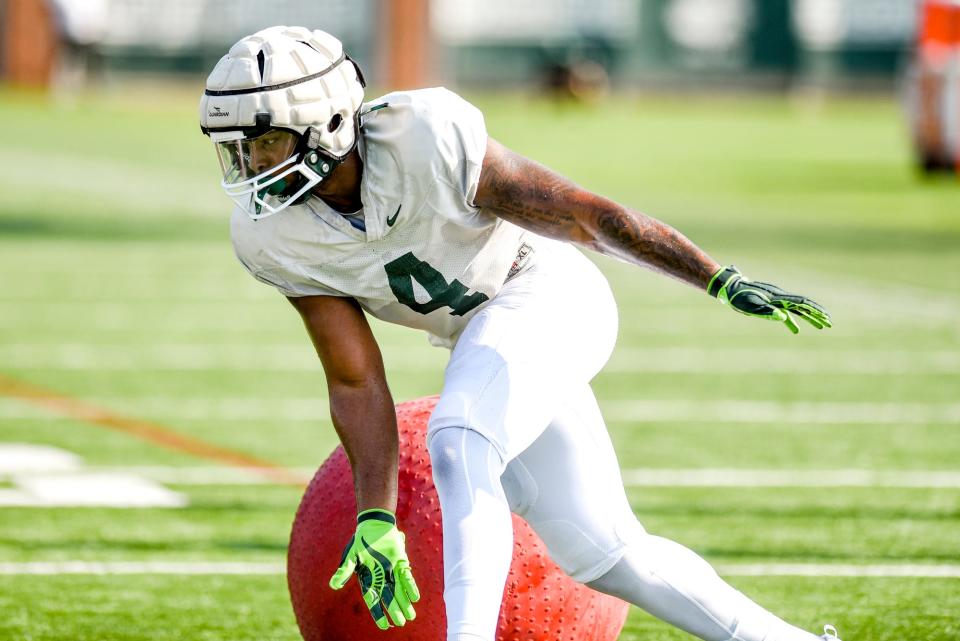 Michigan State linebacker Jacoby Windmon runs a drill during football practice on Wednesday, Aug. 9, 2023, in East Lansing.