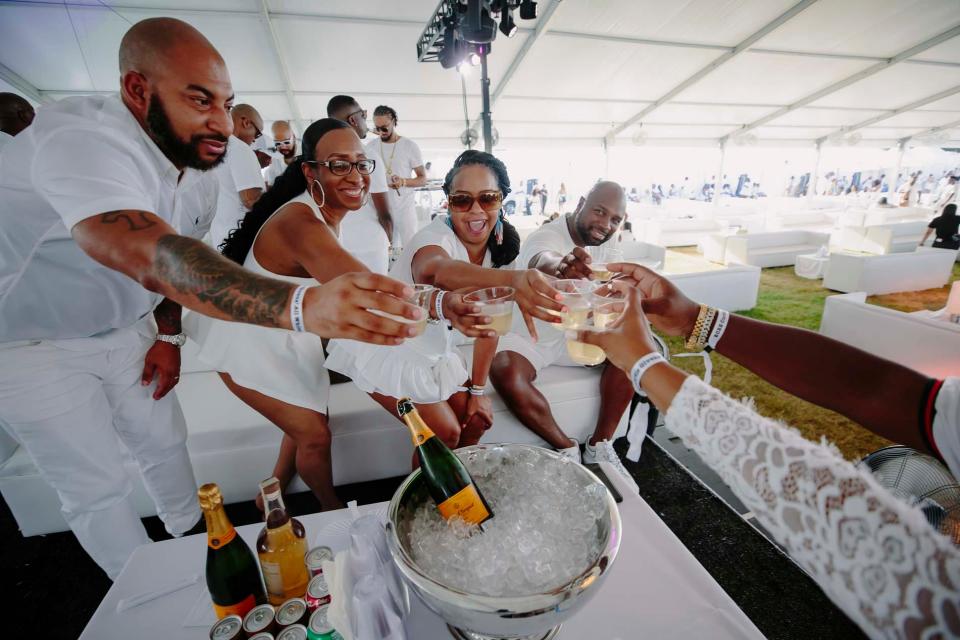 An estimated 2,500 to 3,500 people were expected to attend the All White Affair on Saturday, July 16, 2022, at Mud Island River Park in Memphis. The event is part of Curtis Givens' Can I Live weekend.