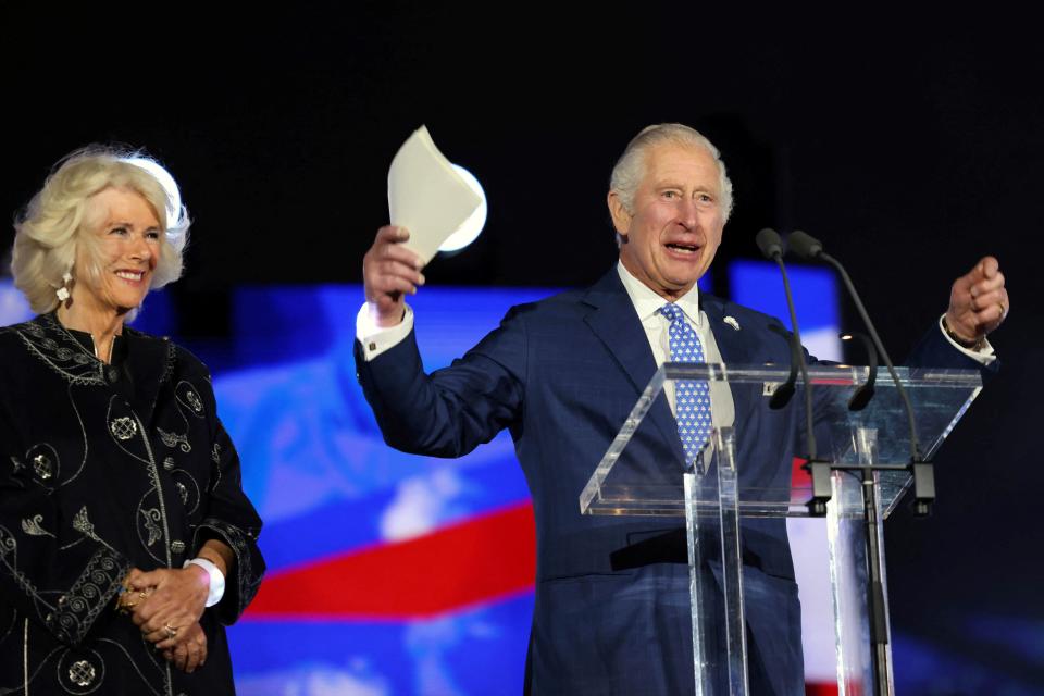 Britain's Prince Charles, Prince of Wales (R), flanked by Britain's Camilla, Duchess of Cornwall delivers a speech during the Platinum Party at Buckingham Palace on June 4, 2022 as part of Queen Elizabeth II's platinum jubilee celebrations. - Some 22,000 people and millions more at home are expected at a star-studded musical celebration for Queen Elizabeth II's historic Platinum Jubilee. (Photo by Jonathan Buckmaster / various sources / AFP) (Photo by JONATHAN BUCKMASTER/AFP via Getty Images)