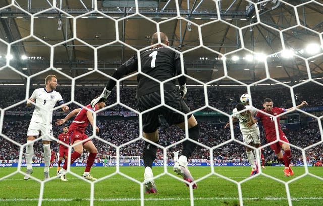 Jude Bellingham, second right, scores his side’s winner against Serbia in Gelsenkirchen 