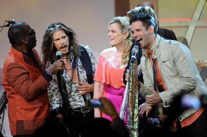 CENTURY CITY, CA - MAY 02: (L-R) TV personality Randy Jackson, musician Steven Tyler, host Nancy Davis, and musician David Osmond perform onstage during the 21st annual Race to Erase MS at the Hyatt Regency Century Plaza on May 2, 2014 in Century City, California. (Photo by Alberto E. Rodriguez/Getty Images for Race to Erase MS)