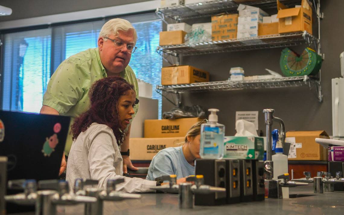 Hannah Pratt, left, a senior at the University of South Carolina Beaufort asks Joe Staton, professor of biology and marine science, a question during their hands on lab work using clay to build models showing the transformation of an embryo on Tuesday, Jan. 17, 2023 at the Science and Technology building at the Bluffton campus. Staton would be one of the professors to lead students to research on Pritchards Island if the $1.25 million funding is approved by the S.C. state legislature.