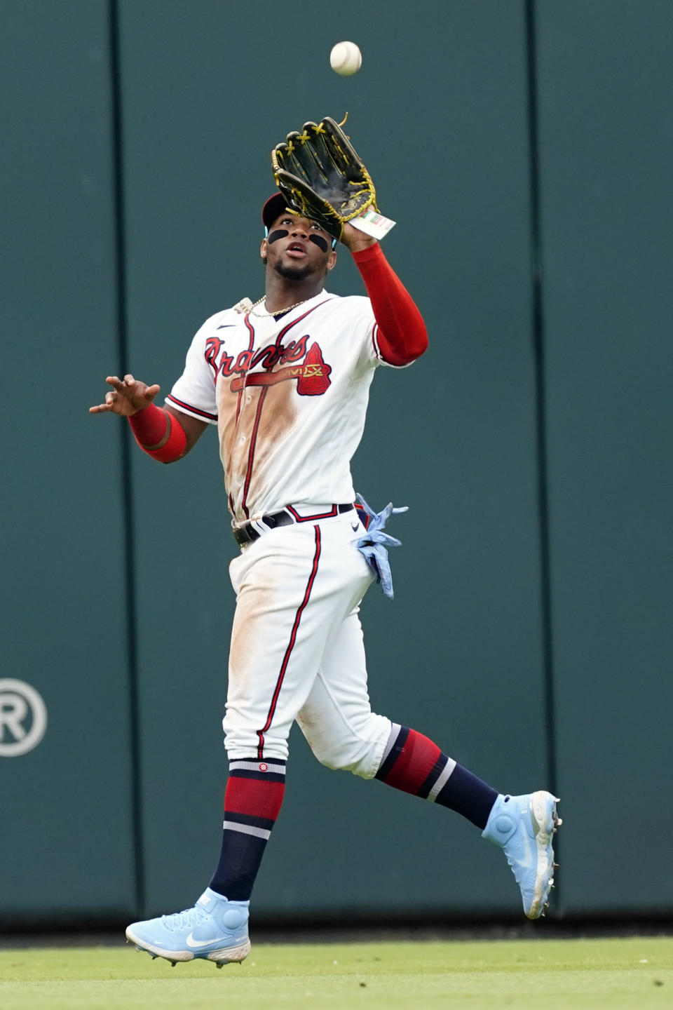 Atlanta Braves right fielder Ronald Acuna Jr. (13) catches a fly ball from New York Mets' Tomas Nido in the eighth inning of a baseball game, Wednesday, July 13, 2022, in Atlanta. (AP Photo/John Bazemore)