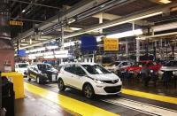 FILE PHOTO: Workers assemble Chevy Bolt EV cars at the General Motors assembly plant in Orion Township