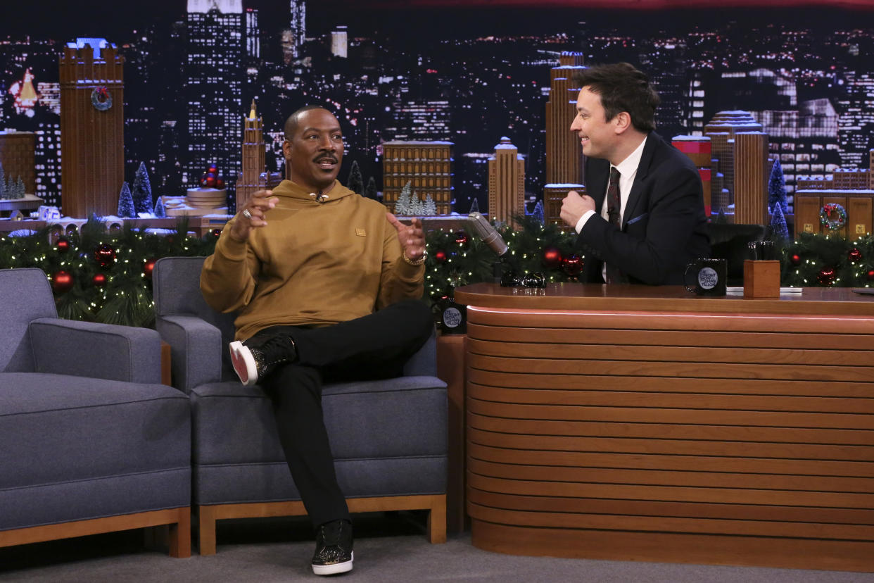 THE TONIGHT SHOW STARRING JIMMY FALLON -- Episode 1180 -- Pictured: (l-r) Actor Eddie Murphy during an interview with host Jimmy Fallon on December 20, 2019 -- (Photo by: Andrew Lipovsky/NBC/NBCU Photo Bank via Getty Images)