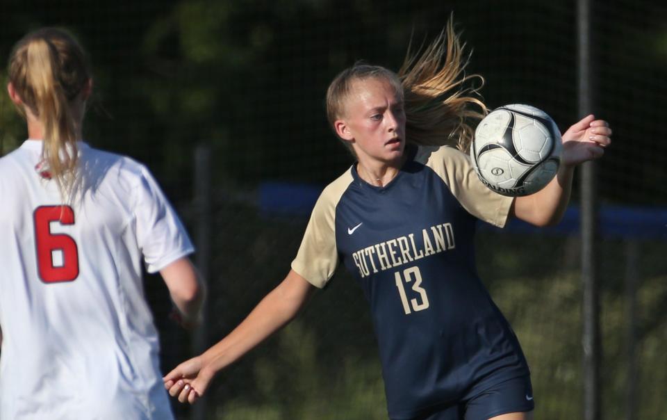 Sutherland's Skyler Fliss (13) gains control of a loose ball ahead of the pressure from Pal-Mac's Molly Seither (6) during their Section V matchup Monday, Sept. 12, 2022 at Pittsford Sutherland High School.