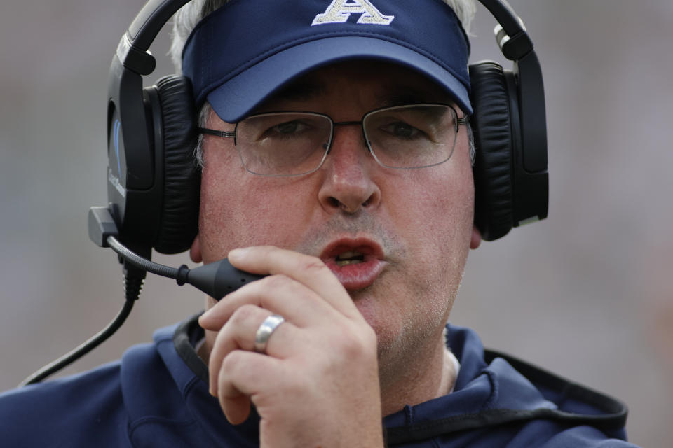 Akron coach Joe Moorhead walks the sideline during the first half of an NCAA college football game against Michigan State, Saturday, Sept. 10, 2022, in East Lansing, Mich. Michigan State won 52-0. (AP Photo/Al Goldis)