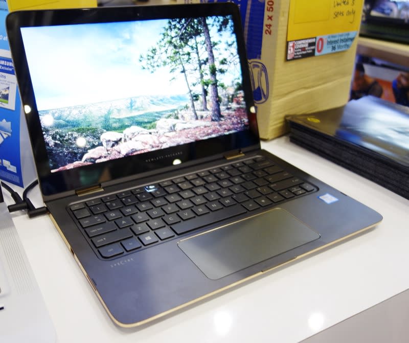 In the convertible department, there's the HP Spectre x360, which comes with an Intel Core i5-6200U processor, 8GB of RAM, and a 128GB SSD. Its speakers have been tuned by Bang & Olufsen, and it also sports a 1080p touchscreen IPS display. It is going for its usual price of $1,599. On top of that, you'll also receive a free HP carrying case, a 1-year McAfee Internet Security subscription, an upgrade to a 2-year local on-site warranty, and a Microsoft Designer Bluetooth mouse.