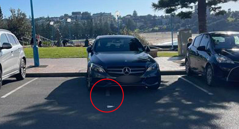 Black Mercedes Benz parking at Coogee beach. 