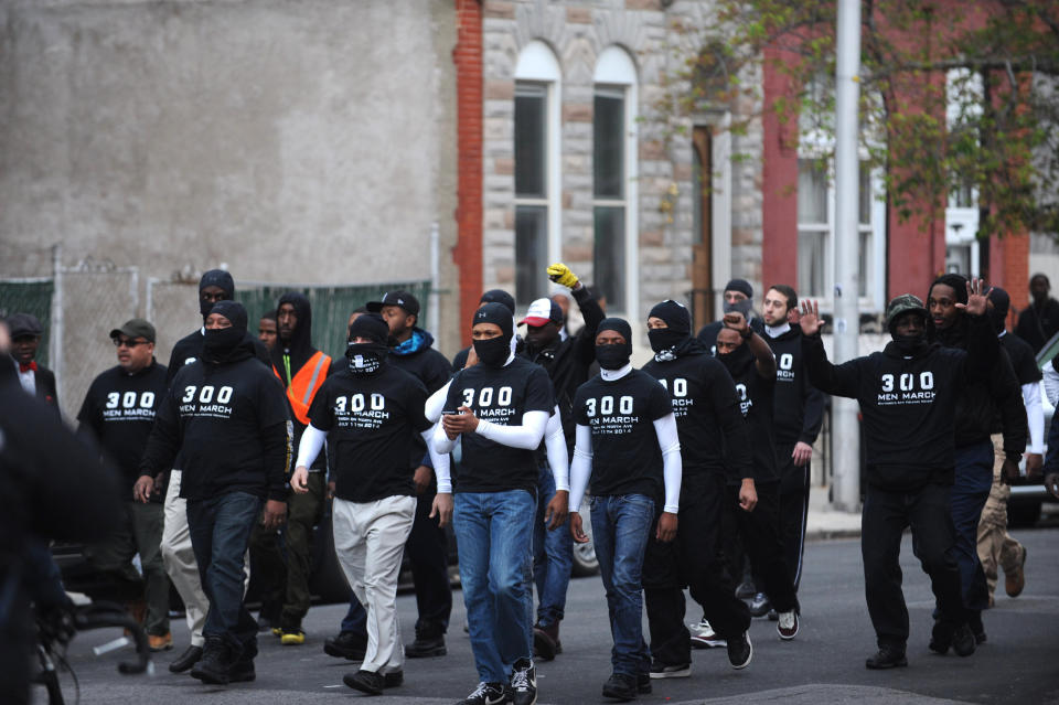 Members of the Baltimore Nonviolent Movement march toward Pennsylvania Avenue to prevent protesters from clashing with police on Monday, April 27, 2015, Baltimore, MD, USA. Photo by Algerina Perna/Baltimore Sun/TNS/ABACAPRESS.COM