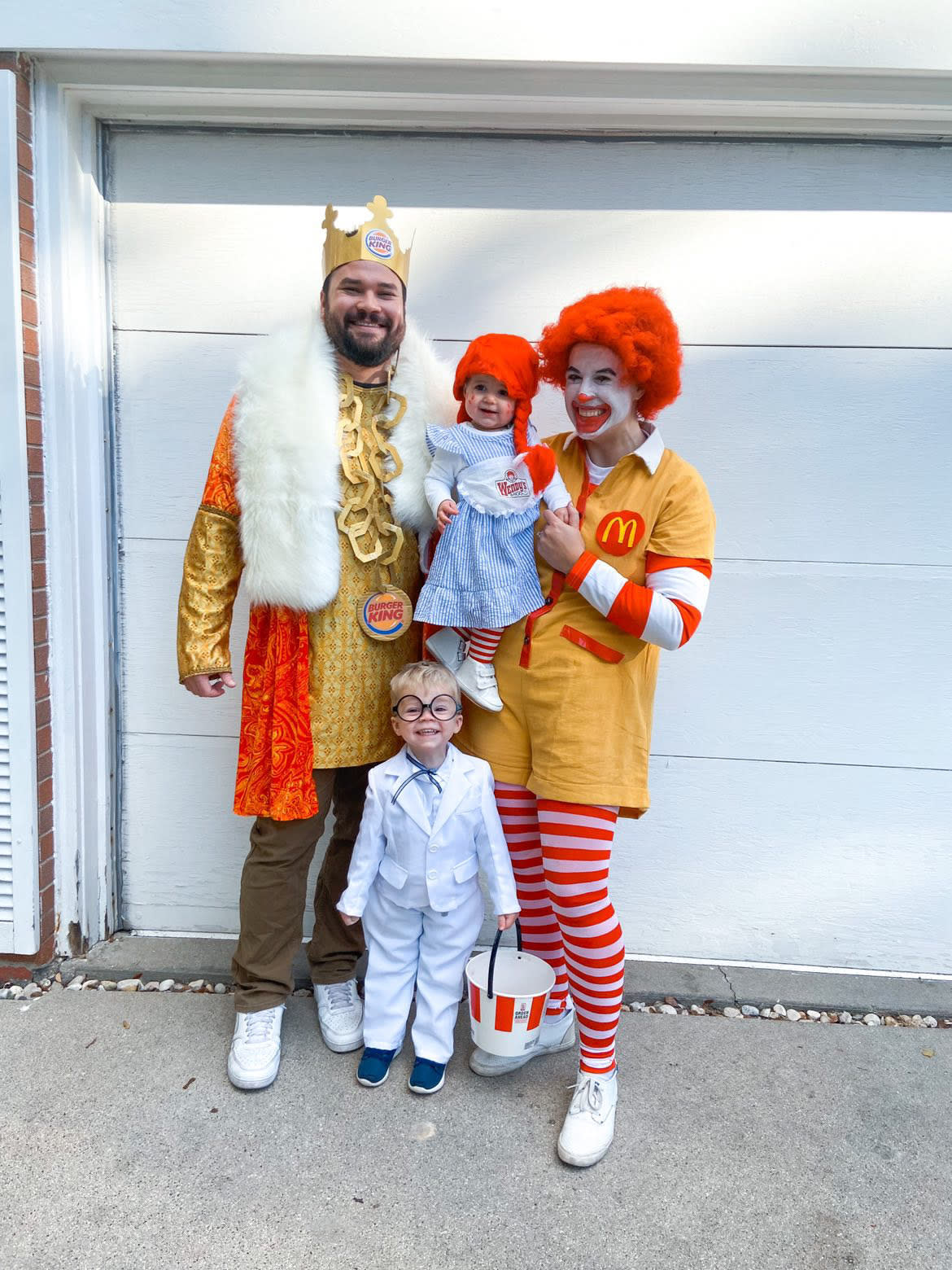 family dressed as burger king, wendys, mcdonalds and KFC for halloween  (Sydney McNeill)