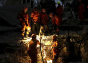 <p>Rescue teams search for victims in the rubble caused by an earthquake at a Mosque in North Lombok, Indonesia, Monday, Aug. 6, 2018. (Photo: Tatan Syuflana/AP) </p>