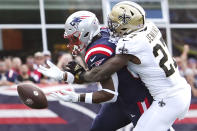 New Orleans Saints strong safety Malcolm Jenkins (27) breaks up a pass to New England Patriots tight end Jonnu Smith, left, during the first half of an NFL football game, Sunday, Sept. 26, 2021, in Foxborough, Mass. (AP Photo/Mary Schwalm)