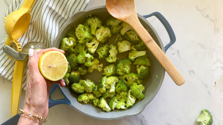 adding lemon to pan