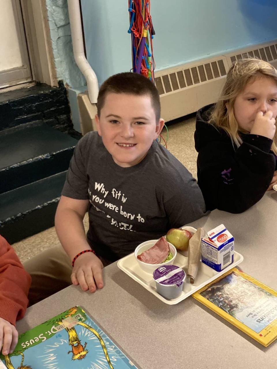 Fourth grader Robert Gorham and third grader Layla Tullos enjoy a breakfast of green eggs and ham to celebrate Dr. Seuss Day at School Street School.