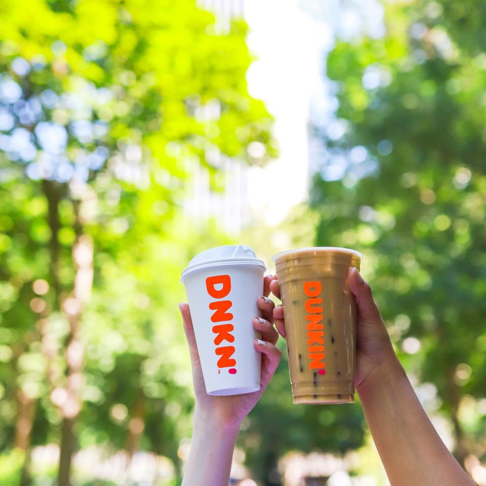 A hot coffee and iced coffee from Dunkin'
