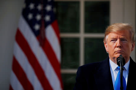 FILE PHOTO: U.S. President Donald Trump pauses during his declaration of a national emergency at the U.S.-Mexico border during remarks about border security in the Rose Garden of the White House in Washington, U.S., February 15, 2019. REUTERS/Carlos Barria/File Photo