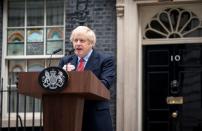 Britain's PM Johnson returns to 10 Downing Street