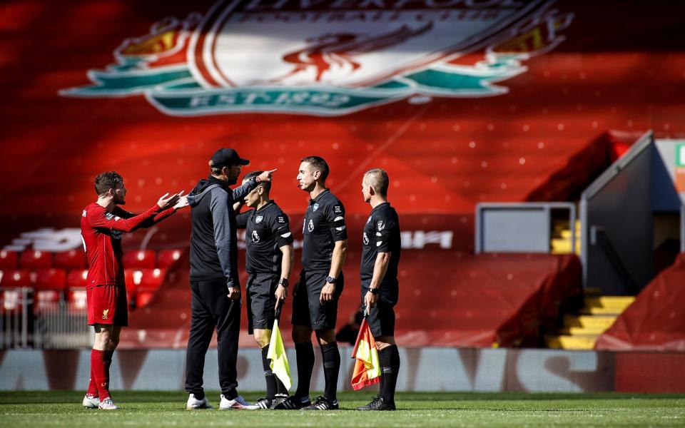 Jurgen Klopp and Andy Robertson remonstrate with the officials - SHUTTERSTOCK