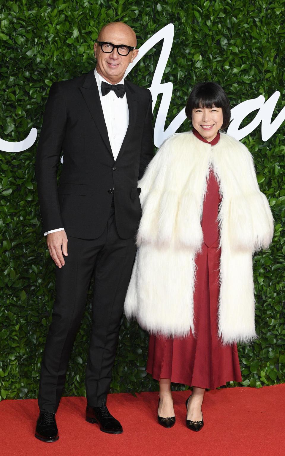  President and CEO of Gucci Marco Bizzarri and Angelica Cheung - Getty Images