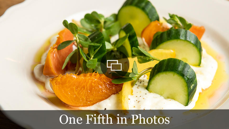 Smashed burrata with peaches and cucumber