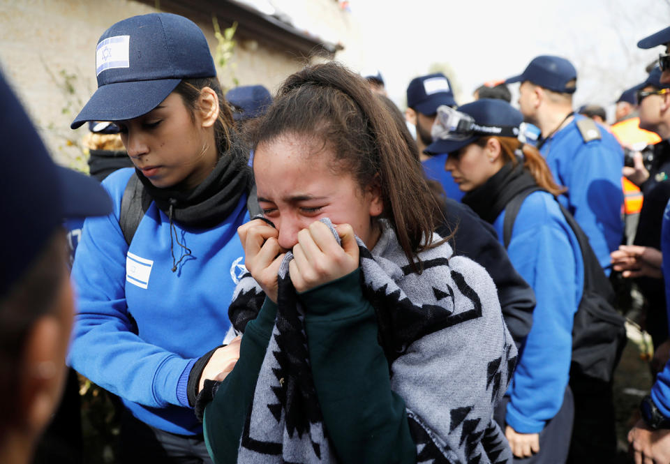 <p>A pro-settlement activist reacts as Israeli police evict settlers from the West Bank settlement of Ofra, Tuesday, Feb. 28, 2017. REUTERS/Ronen Zvulun </p>