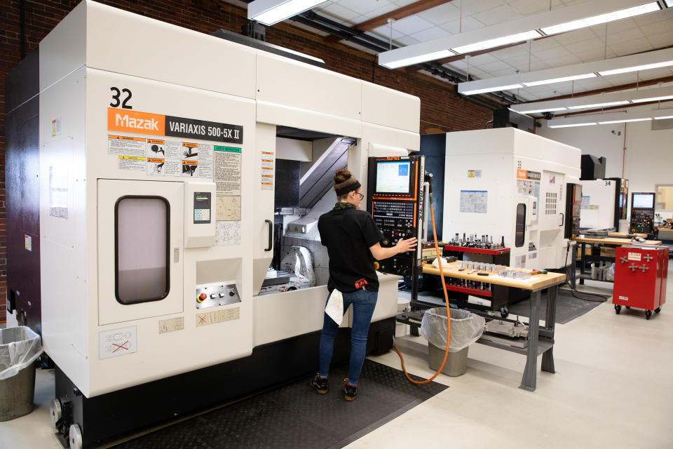 Machinist Dana Stark works in the machine shop at DEKA Research, where parts for the iBOT personal mobility device are made, on May 4, 2021, in Manchester, New Hampshire.  (Kayana Szymczak for Yahoo News)





