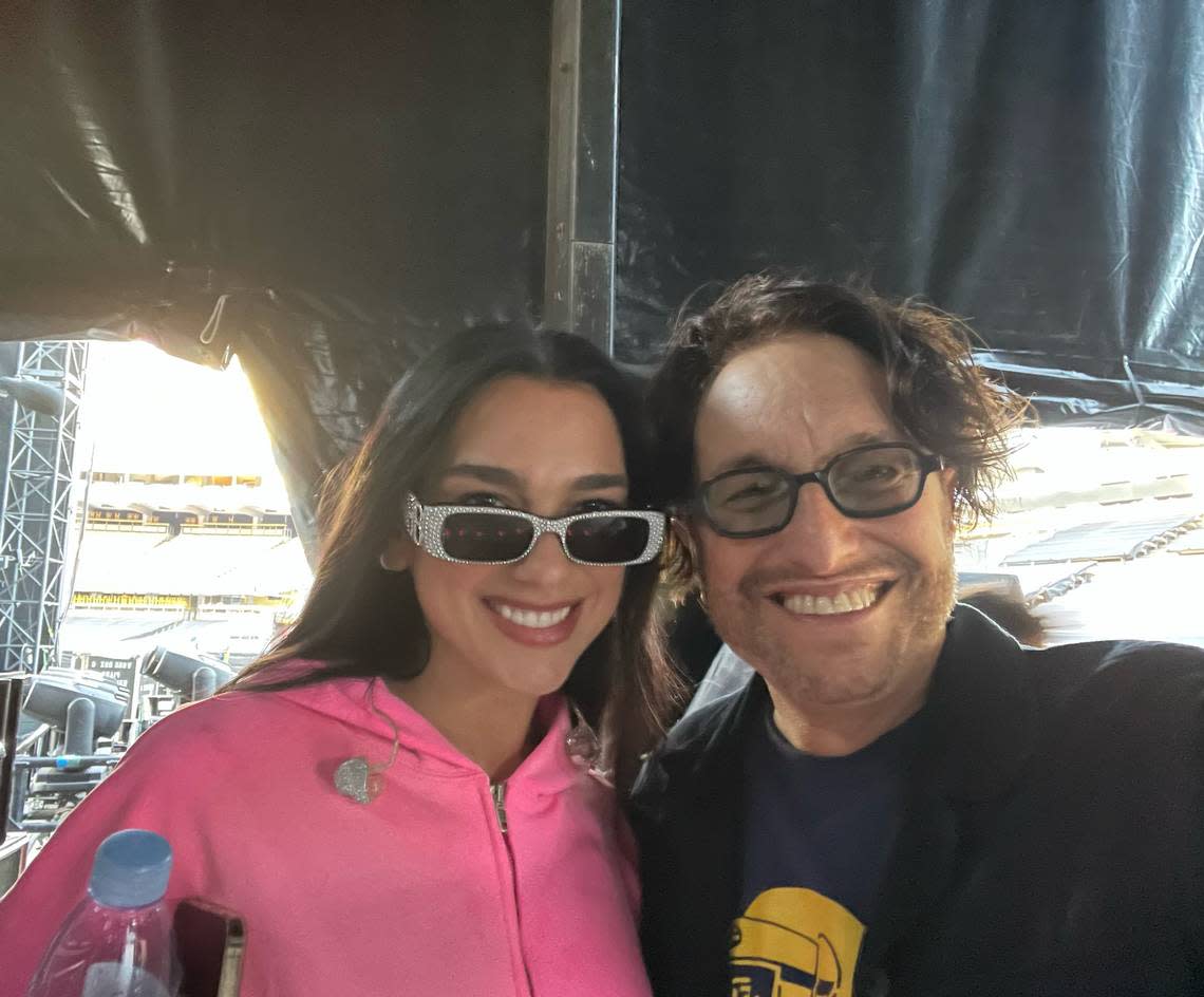 Singer Dua Lipa and Adam Chester, Elton John’s rehearsal pianist, backstage at Elton’s Dodger Stadium concert on Nov. 20, 2022. Dua Lipa was Elton’s special guest where they performed a duet of their 2021 worldwide smash, “Cold Heart,” as one of the encore songs.