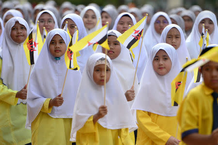 Students attend the 34th National Day celebrations in Bandar Seri Begawan, Brunei February 24, 2018. Picture taken February 24, 2018. REUTERS/Ahim Rani