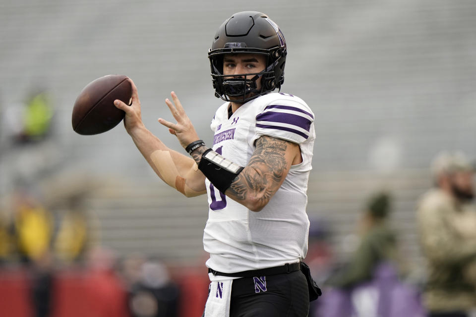 Nov. 11, 2023; Madison, Wisconsin; Northwestern Wildcats quarterback Brendan Sullivan (6) throws a pass during warmups prior to the game against the Wisconsin Badgers at Camp Randall Stadium. Jeff Hanisch-USA TODAY Sports