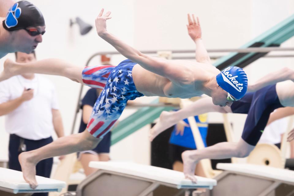 Spring Grove's Daniel Gordon dives off the starting block during the 50-yard freestyle at the 2022 YAIAA Swimming and Diving Championships at Central York High School, Friday, Feb. 11, 2022, in Springettsbury Township. Gordon set a new district record on Saturday while winning the 100 freestyle championship.