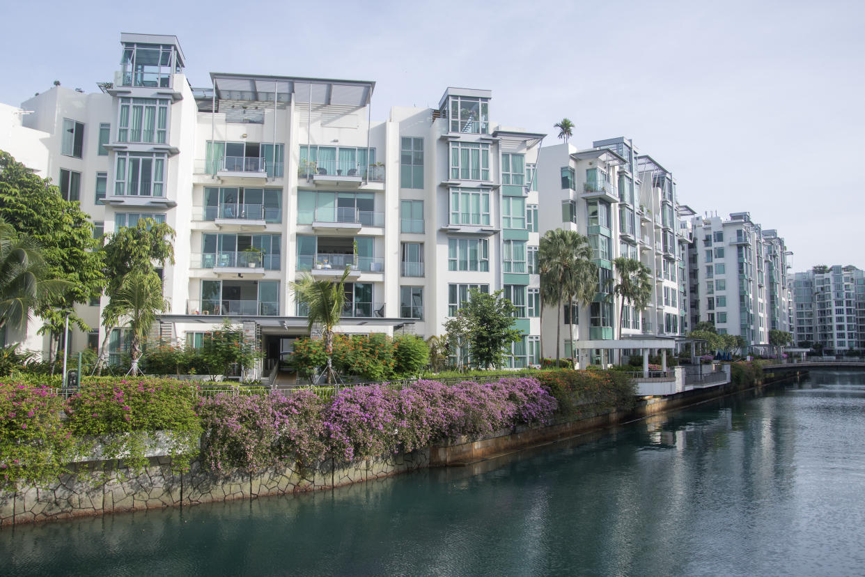 Singapore home prices surge most in decade as curbs test market. (Getty Commercial)