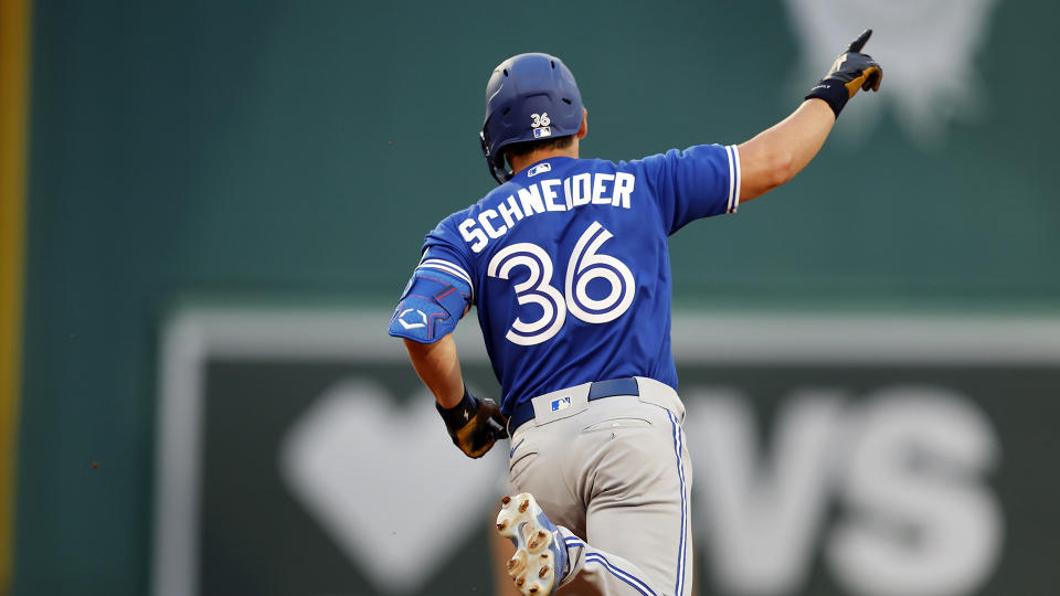 Toronto Blue Jays' Davis Schneider rounds the bases on his solo home run during the second inning. (AP Photo/Michael Dwyer)
