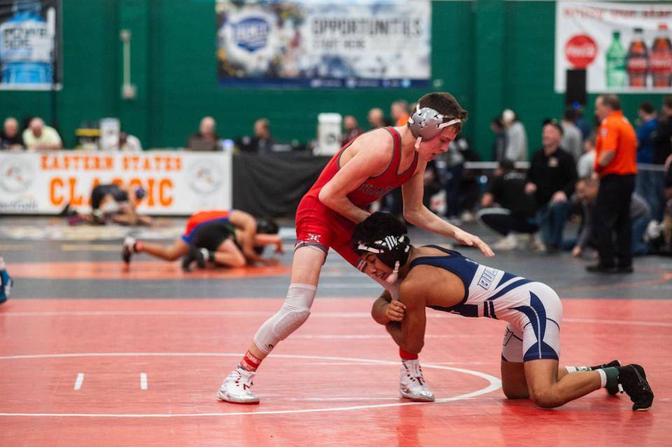 Somers-North Salem's Ryan Ball, left, wrestles Hewlett's Carlos Salazar in the 116 pound weight class during Eastern States Classic wrestling at SUNY Sullivan in Loch Sheldrake, NY on Friday, January 12, 2024. KELLY MARSH/FOR THE JOURNAL NEWS